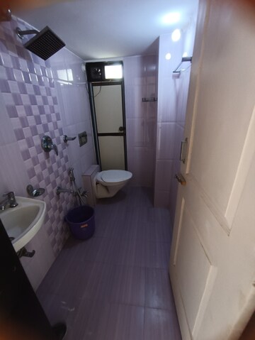 Bathroom in 2 BHK Apartment at Kishkant CHS, Kandivali West – for Rent