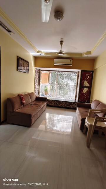 Living Room in 1 BHK Apartment at Rustomjee Regal, Dahisar West – for Rent