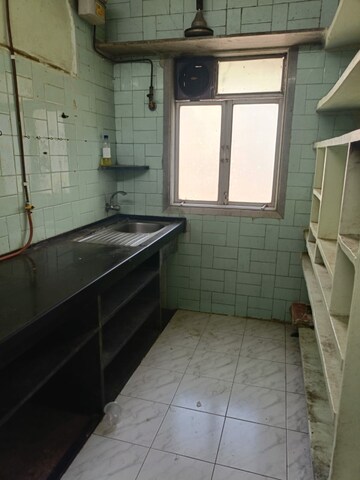 Kitchen in 1 BHK Apartment at Mandpeshwar Dham CHS, Ic Colony – for Rent