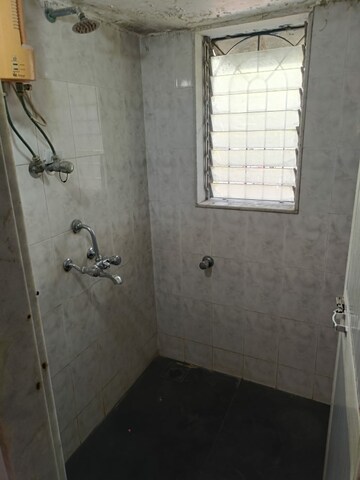 Bathroom in 1 BHK Apartment at Mandpeshwar Dham CHS, Ic Colony – for Rent
