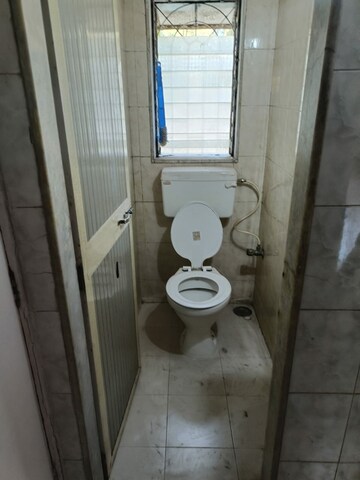 Bathroom in 1 BHK Apartment at Mandpeshwar Dham CHS, Ic Colony – for Rent