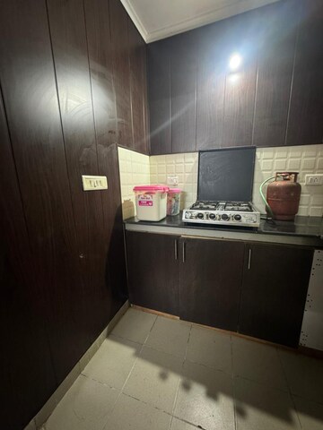 Kitchen in 1 RK Apartment at Jaipurias Sunrise Greens Zirakpur, Vip Road – for Rent