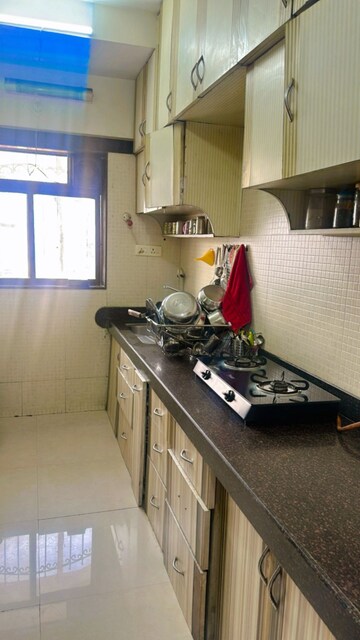 Kitchen in 3 BHK Apartment at Tharwani Heritage, Kharghar Sector 7 – for Rent
