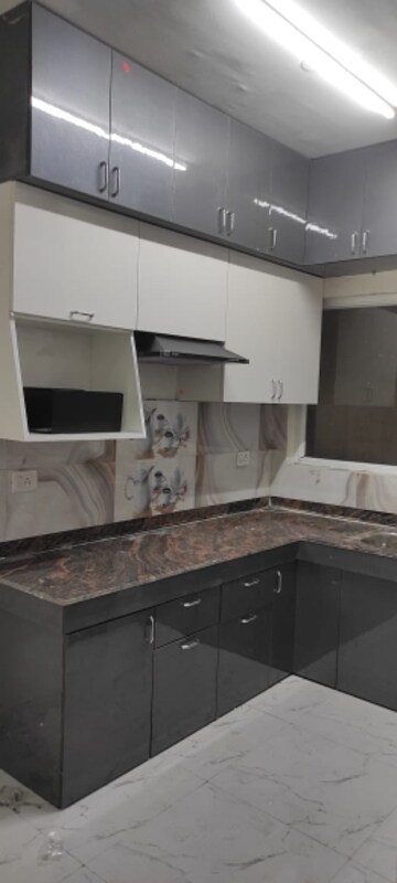 Kitchen in 2 BHK Apartment at ROF Aalayas, Sector 102 – for Rent