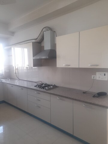 Kitchen in 4 BHK Apartment at Emaar The Palm Drive-Palm Studios, Sector 66 – for Rent
