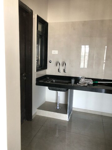 Kitchen in 2 BHK Apartment at Sun City, Sinhagad Road – for Rent