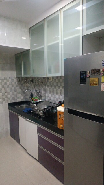 Kitchen in 2 BHK Apartment at Seawoods – for Sale