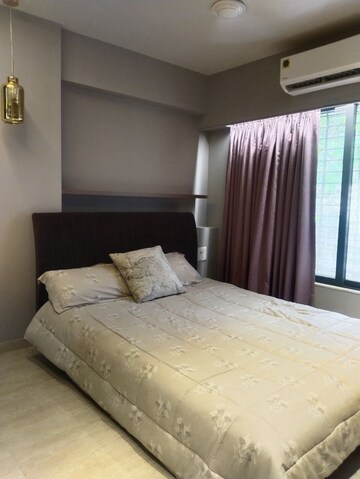 Bedroom in 2 BHK Apartment at RNA NG Eclat, Andheri West – for Rent