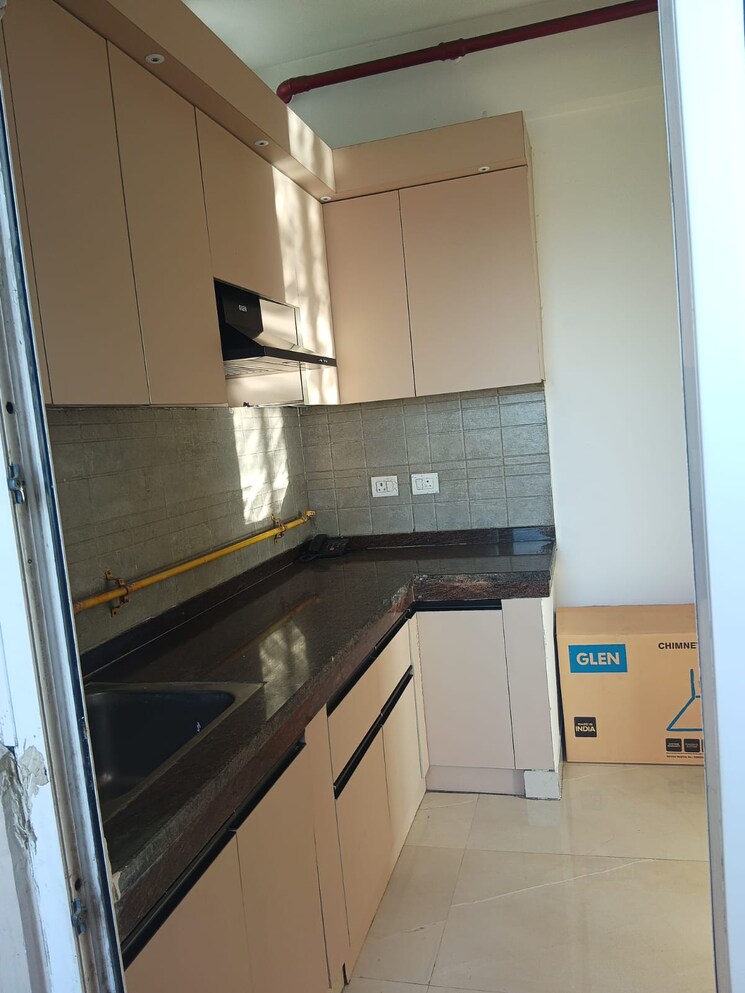 Kitchen, amrapali-golf-homes 2.5 Bedroom 945 Sq.Ft. Apartment In Sector 4 Greater Noida Greater Noida 8287098