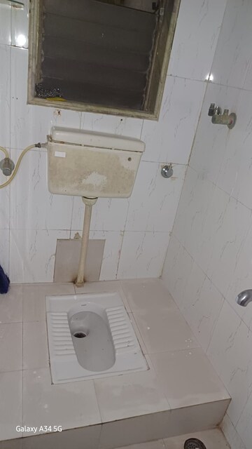 Bathroom in 2 BHK Apartment at Orchid Gaurav Valley, Mira Road – for Rent