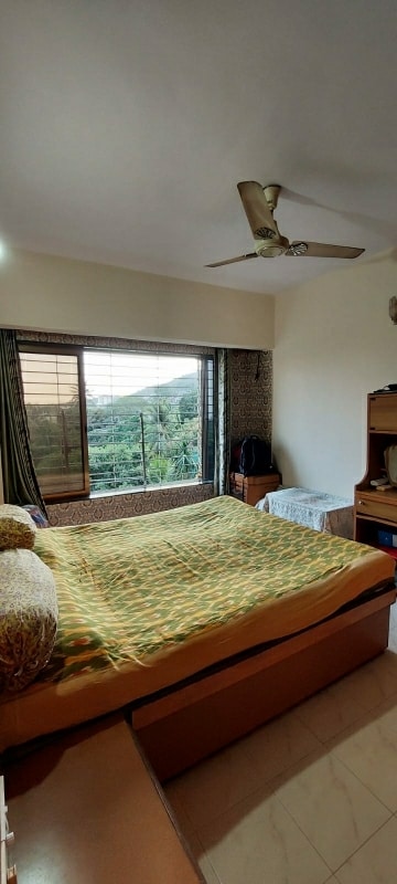 Bedroom in 2 BHK Apartment at Vasant Garden, Mulund West – for Sale