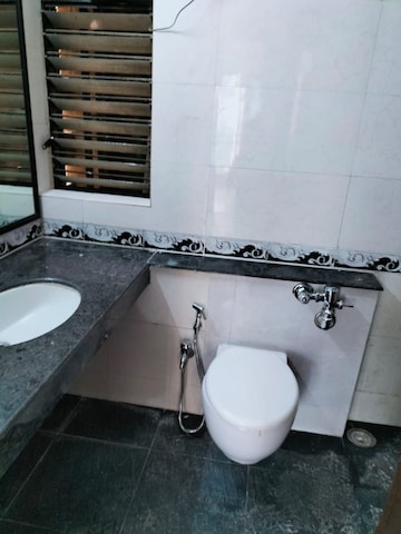 Bathroom in 2 BHK Apartment at K Raheja Heights, Malad East – for Rent
