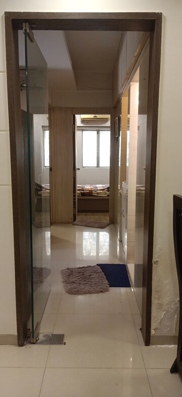 Building Lobby in 2 BHK Apartment at Silver Sand CHS, Andheri West – for Rent