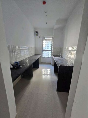 Kitchen in 2 BHK Apartment at Kalpataru Immensa, Kolshet Road – for Rent