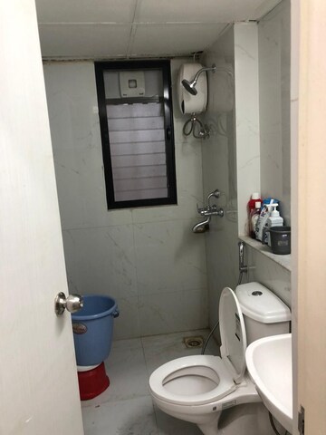 Bathroom in 3 BHK Apartment at Runwal Gardens, Dombivli East – for Rent