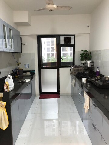 Kitchen in 3 BHK Apartment at Runwal Gardens, Dombivli East – for Rent