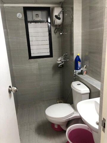 Bathroom in 3 BHK Apartment at Runwal Gardens, Dombivli East – for Rent