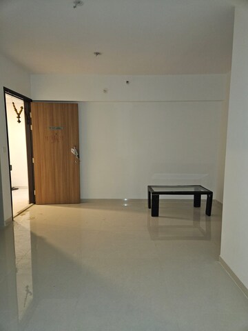 Living Room in 2 BHK Apartment at Lodha Casa Prima, Shilphata – for Rent