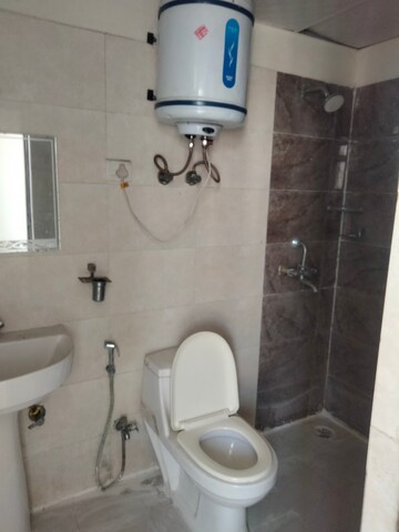 Bathroom in 2 BHK Apartment at Proview Officer City 2, Raj Nagar Extension – for Rent