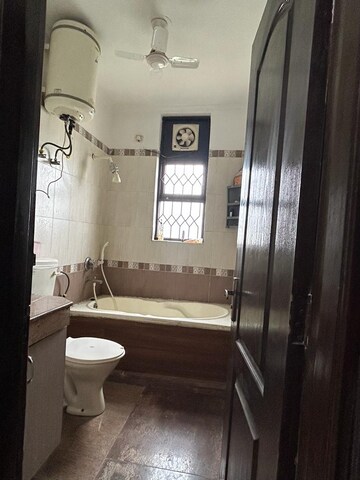 Bathroom in 3 BHK Builder Floor at Ansal Palam Triangle, Palam Vihar Extension – for Rent