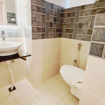 Bathroom in 3 BHK Apartment at Sushma Joynest ZRK, Ghazipur – for Rent