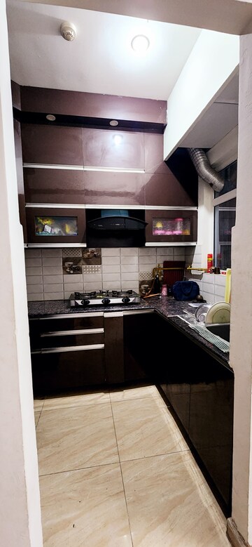 Kitchen in 2 BHK Apartment at Prateek Wisteria, Sector 77 – for Sale