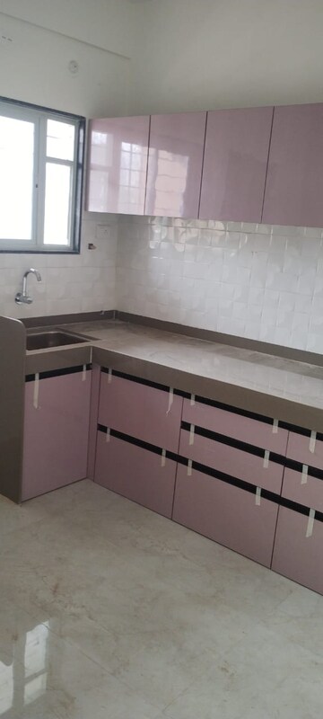 Kitchen in 2 BHK Apartment at Renuka Gulmohar C Building CHS, Pimpri – for Rent