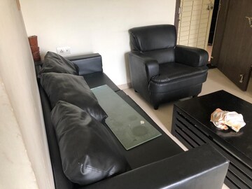 Living Room in 2 BHK Apartment at Windsor Maple Woodz, Wagholi – for Rent