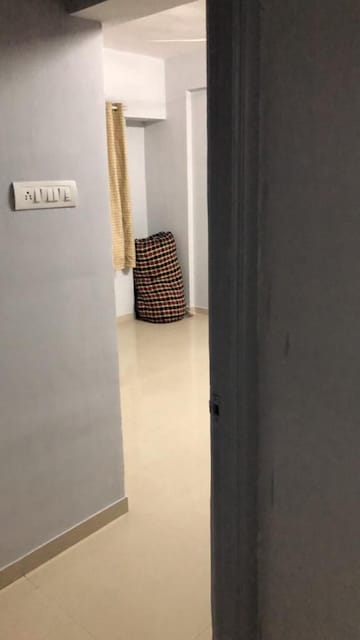 Bedroom in 2 BHK Apartment at Windsor Maple Woodz, Wagholi – for Rent