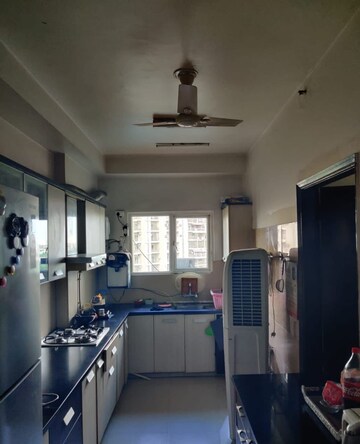 Kitchen in 3 BHK Apartment at Gaur Sportswood, Sector 79 – for Rent