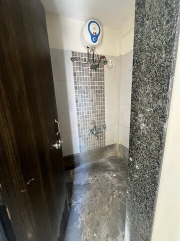 Bathroom in 2 BHK Apartment at Gangotree Dhanvantari, Kothrud – for Rent