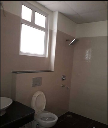Bathroom in 3 BHK Apartment at Rishita Manhattan, Gomti Nagar – for Rent