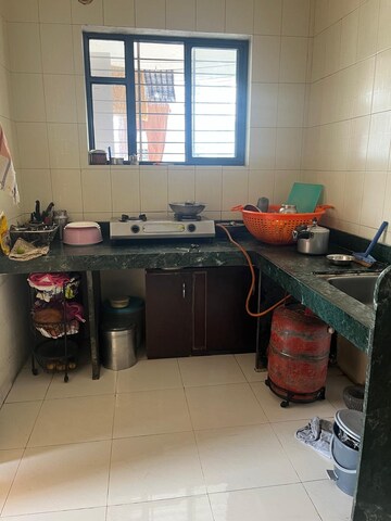 Kitchen in 2 BHK Apartment at Suvarna Park, Bavdhan – for Sale