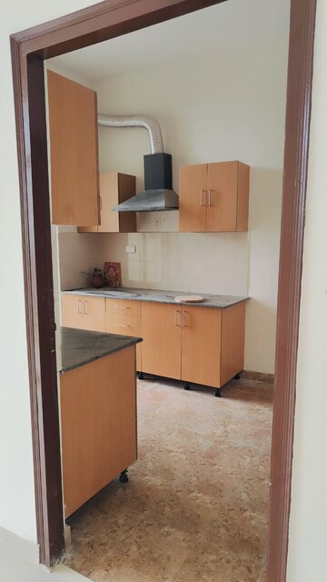 Kitchen in 2 BHK Apartment at Ansals Celebrity Greens, Sushant Golf City – for Rent