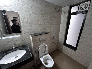 Bathroom in 3 BHK Apartment at Shapoorji Pallonji Sensorium, Hinjewadi – for Rent