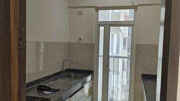 Kitchen in 2 BHK Apartment at Marathon Nexzone, New Panvel – for Rent