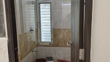 Bathroom in 2 BHK Apartment at Marathon Nexzone, New Panvel – for Rent