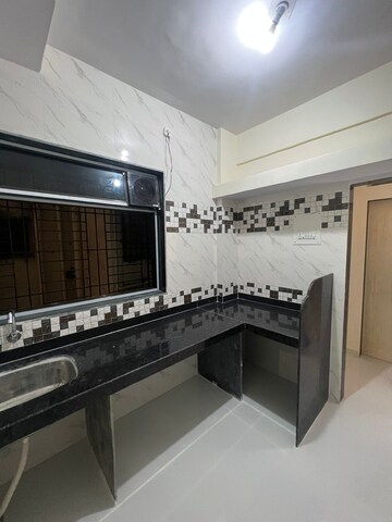 Kitchen in 2 BHK Apartment at Awas CHS Kamothe, Kamothe – for Rent