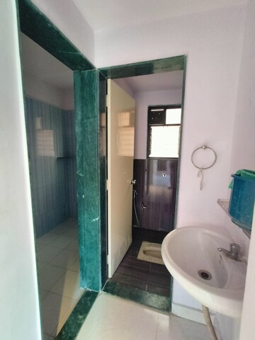 Bathroom in 2 BHK Apartment at Wadgaon Sheri – for Rent