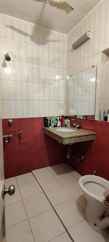 Bathroom in 2 BHK Apartment at Defence Colony – for Rent