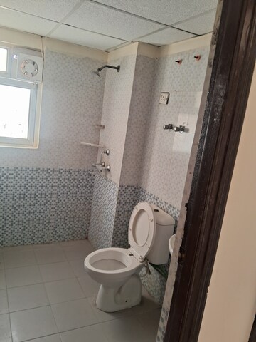 Bathroom in 3 BHK Apartment at Aims Golf City, Sector 75 – for Sale