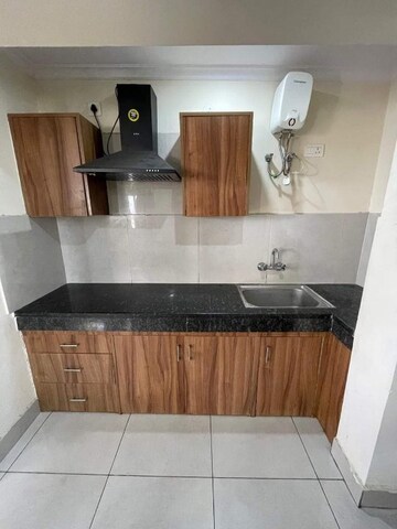Kitchen in 1 BHK Apartment at HBH Galaxy Apartments, Sector 43 – for Rent