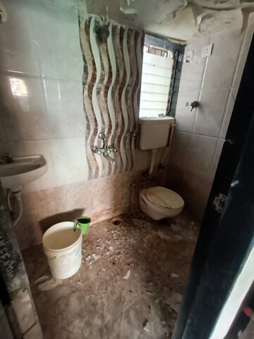 Bathroom in 2 BHK Apartment at Mira Nagar – for Sale
