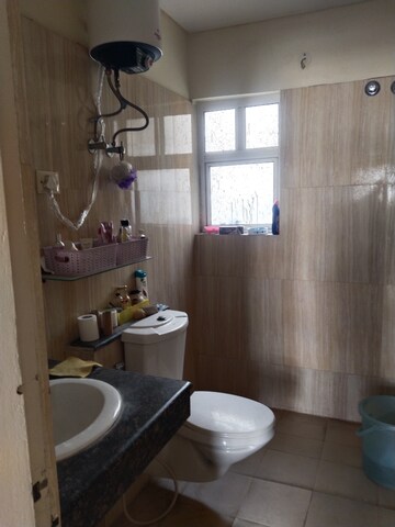 Bathroom in 2.5 BHK Apartment at Vatika Lifestyle Homes, Sector 83 – for Rent