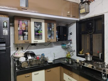 Kitchen in 1 BHK Apartment at Amar Shanti Nagar CHS, Mira Road – for Sale