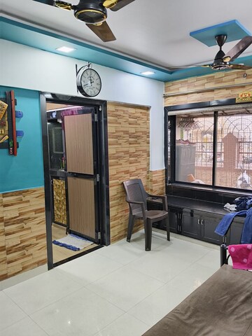 Living Room in 1 BHK Apartment at Amar Shanti Nagar CHS, Mira Road – for Sale