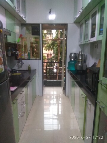Kitchen in 2 BHK Apartment at Mahadev Complex, Mira Road – for Sale