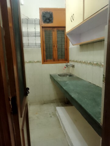 Kitchen in 1.5 BHK Builder Floor at Khirki Extension – for Rent