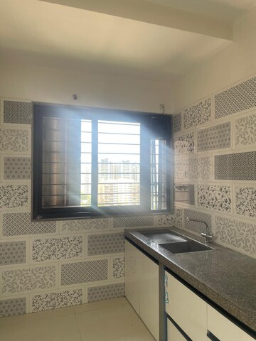 Kitchen in 2 BHK Apartment at Kumar Prospera Hadapsar, Amanora Park Town – for Sale
