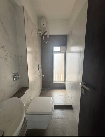 Bathroom in 2 BHK Apartment at Devika Towers, Collectors Colony – for Rent